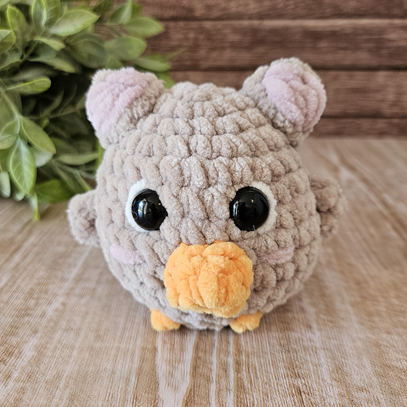 peluche poussin-chat